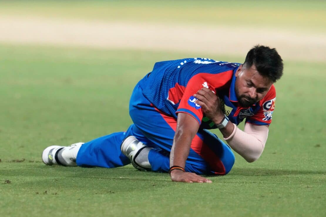Delhi Capitals' Mukesh Kumar is injured after colliding with his teammate
